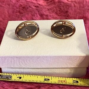 Like new Vintage Two-tone silver on gold monogrammed cursive E cufflinks